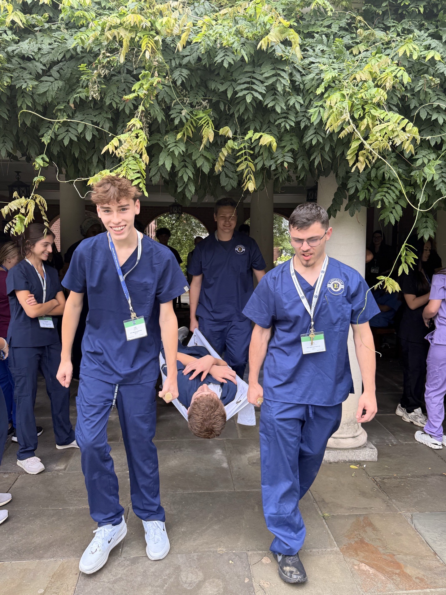 Another student and I learn outdoor emergency medicine.